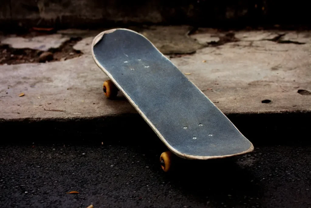 Close-up of a skateboard on a city street