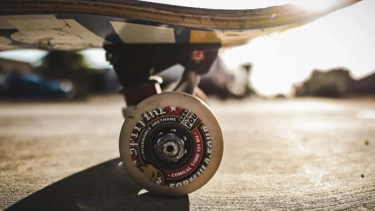 Close-up of a skateboard wheel on concrete